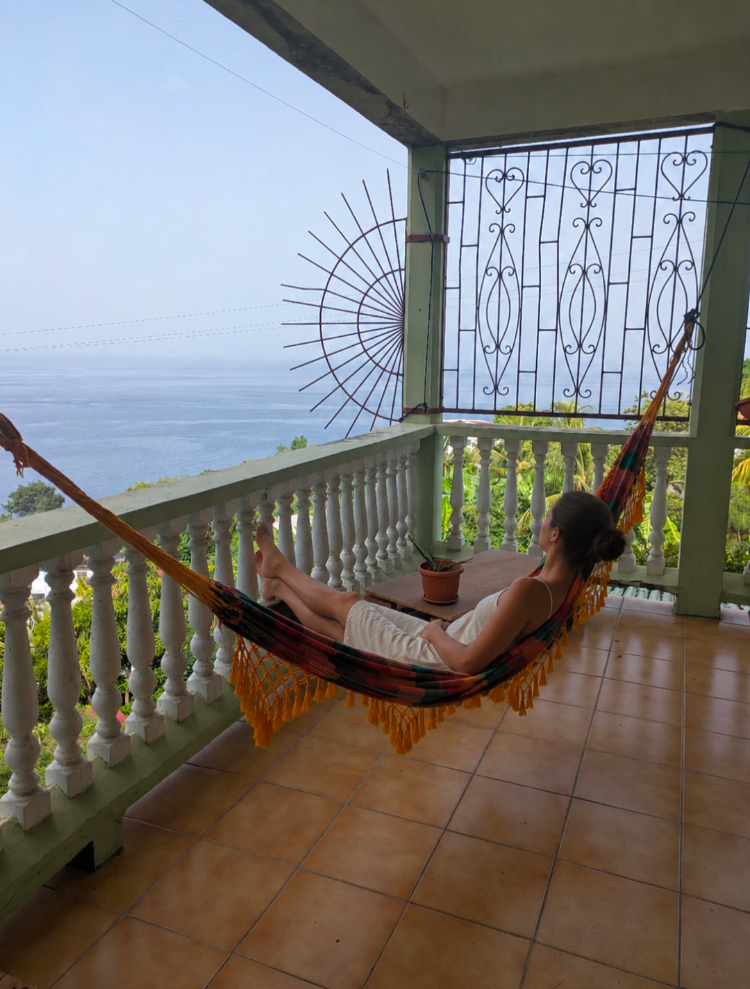 Guest relaxing in the hammock area